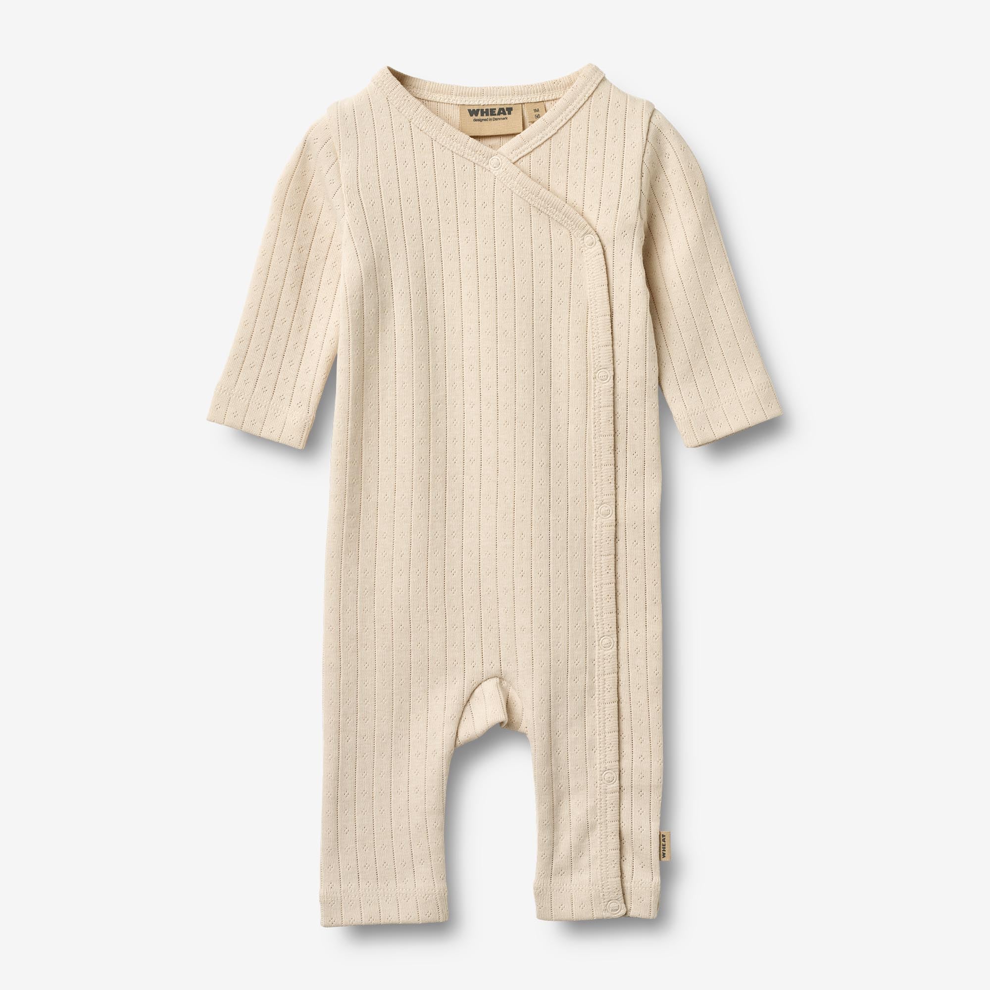 Wrapsuit L/S Everest - almond peach